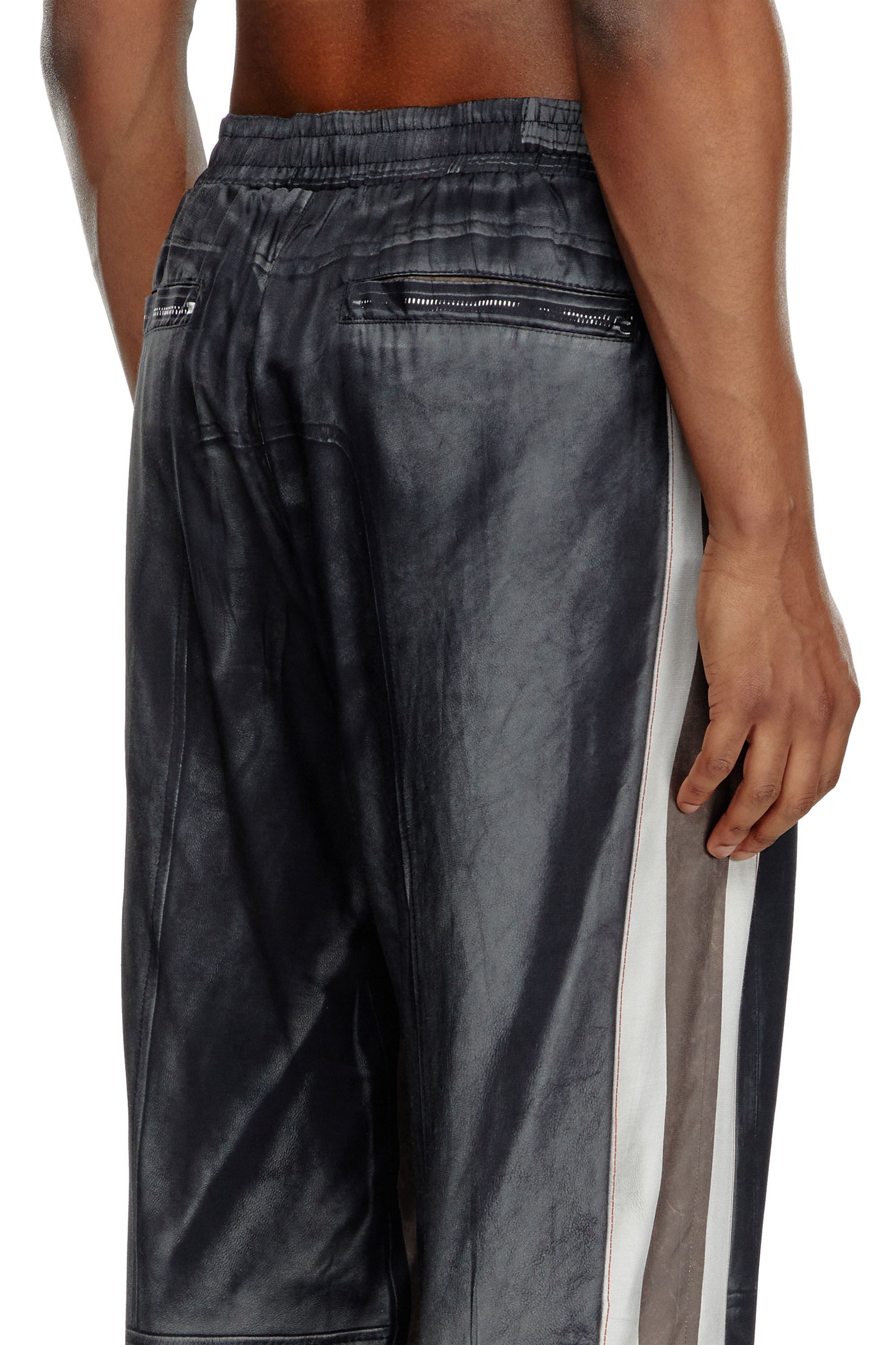 Men's Viscose pants with leather-effect print | Black | Diesel