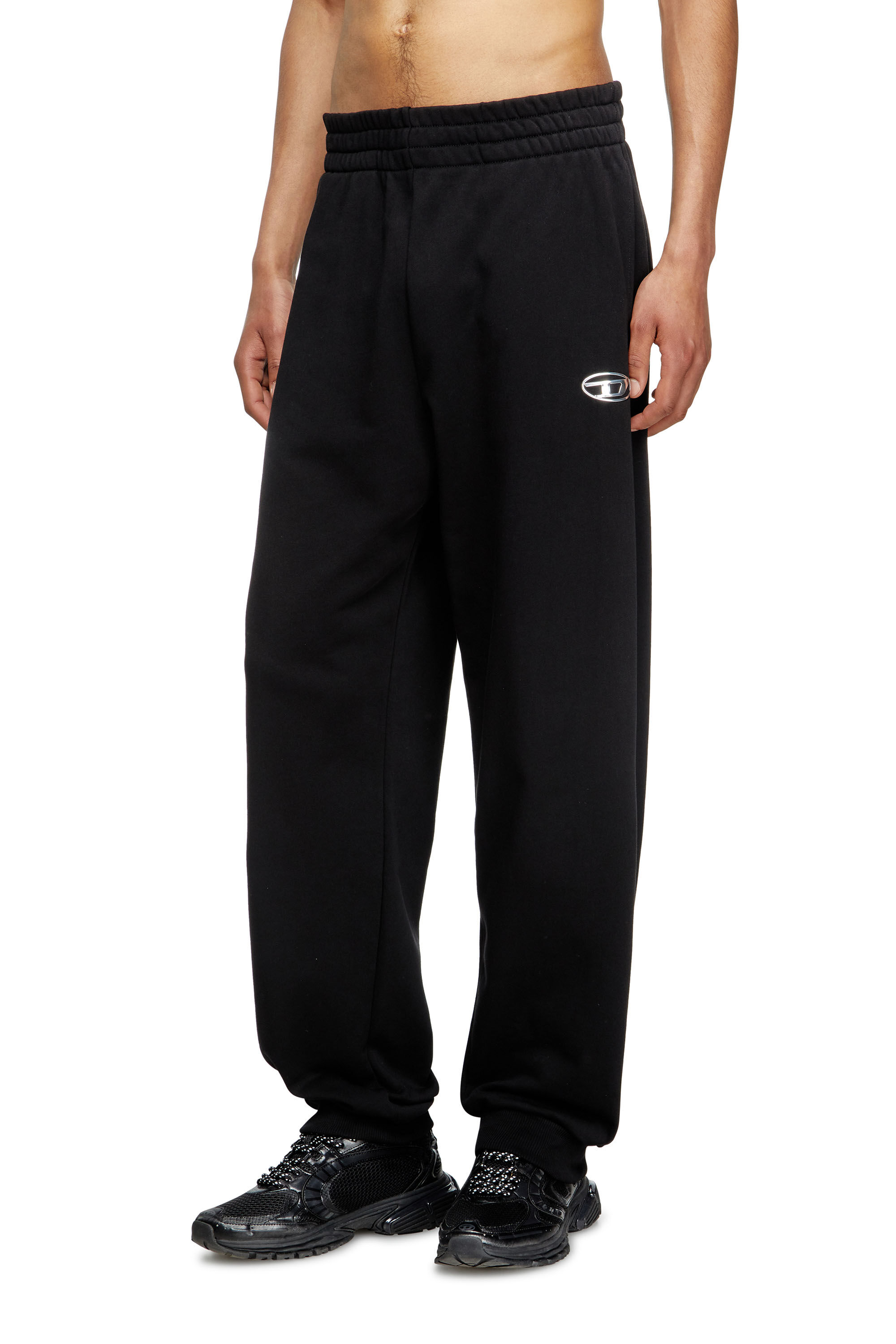 Men's Pants with metal-effect Oval D logo | Black | Diesel