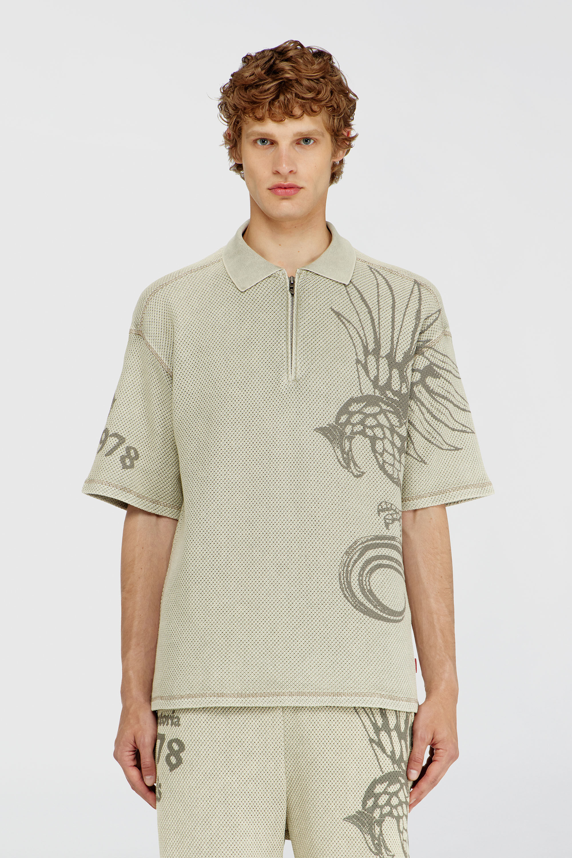 Diesel - T-ERRY-ZIP, Man's Mesh-jacquard polo shirt with Phoenix print in Beige - 1