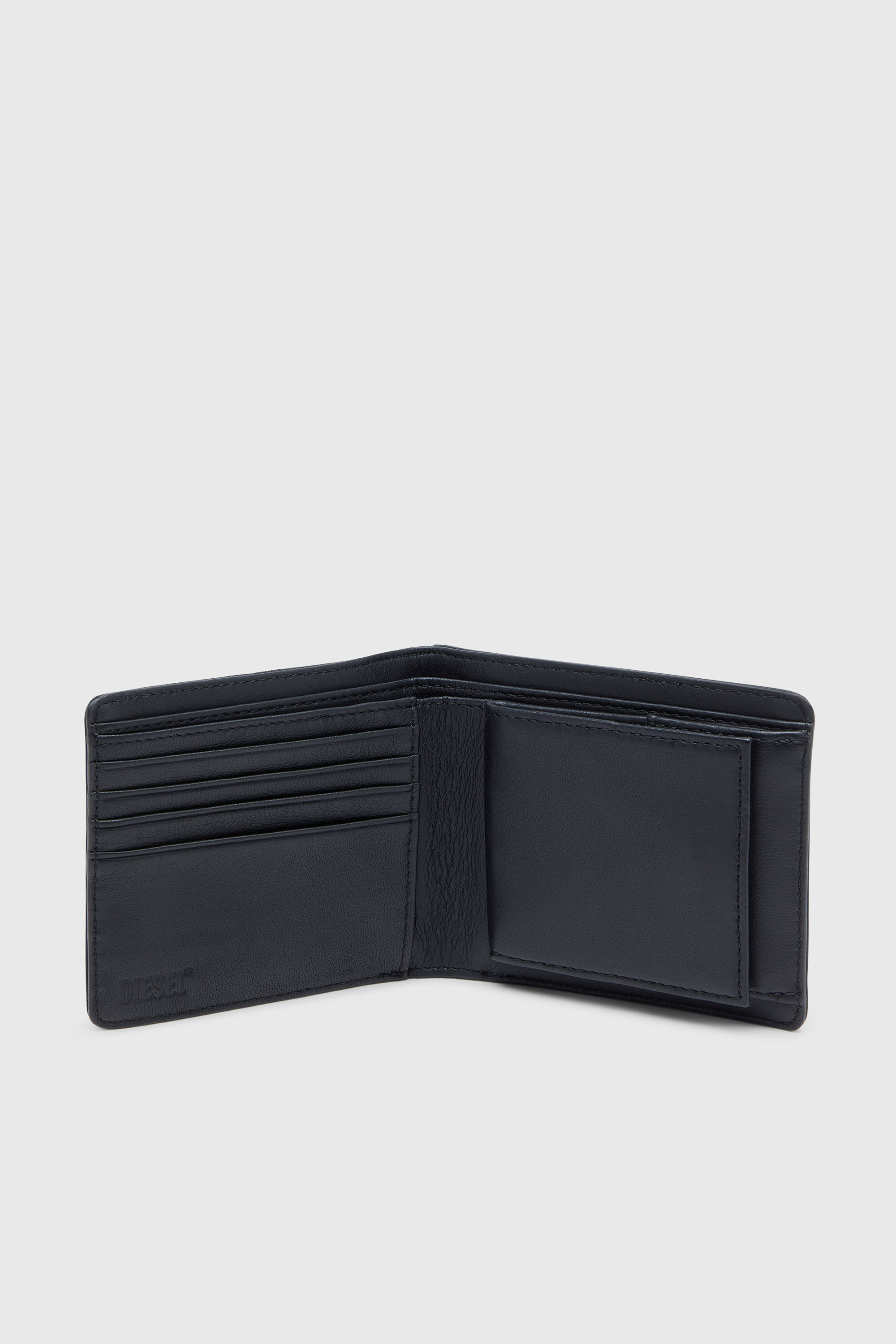 Diesel - MULTI-PKTS BI FOLD COIN S 3D, Man's Leather bi-fold wallet with metal logo plaque in Black - 3