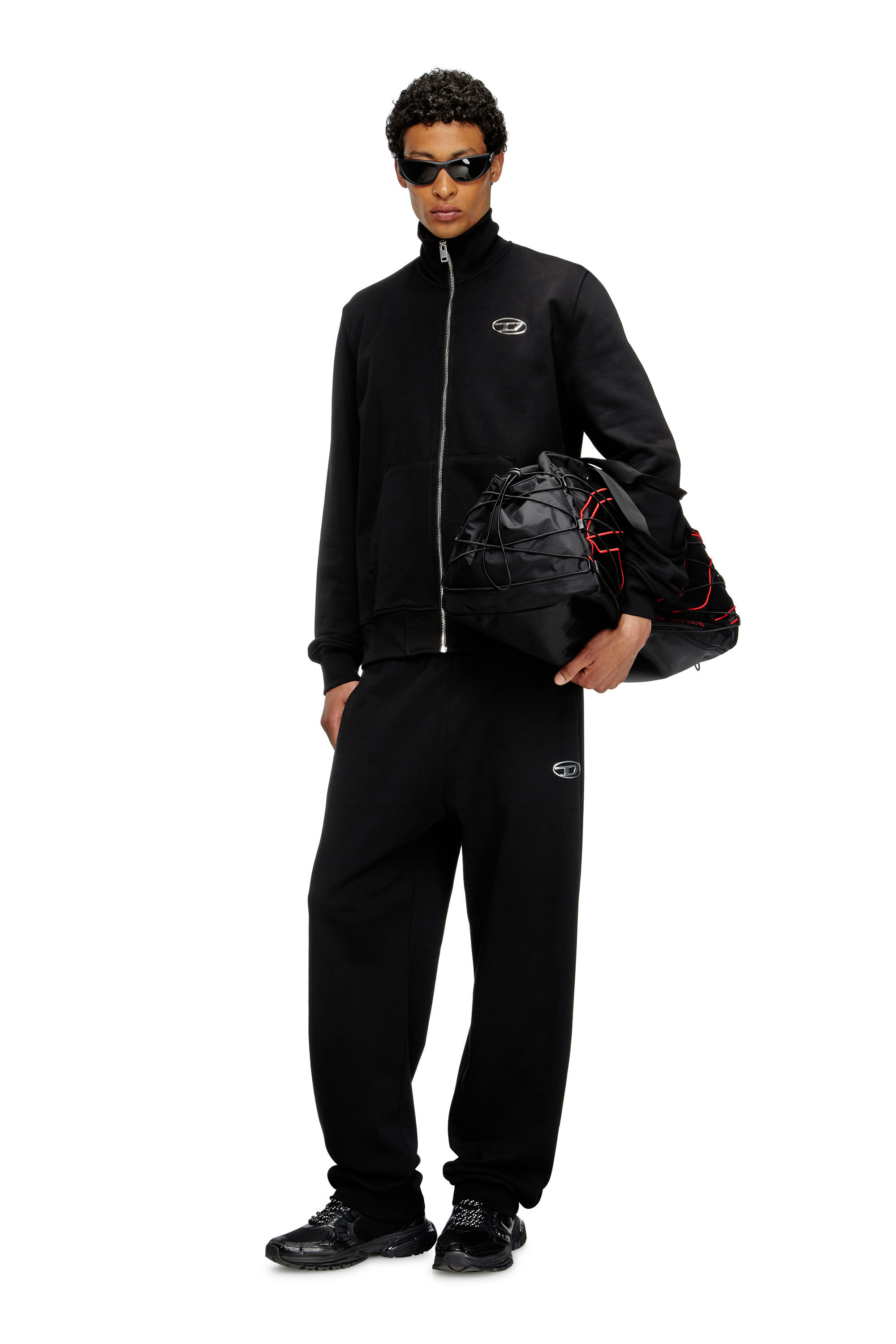 Men's Pants with metal-effect Oval D logo | Black | Diesel