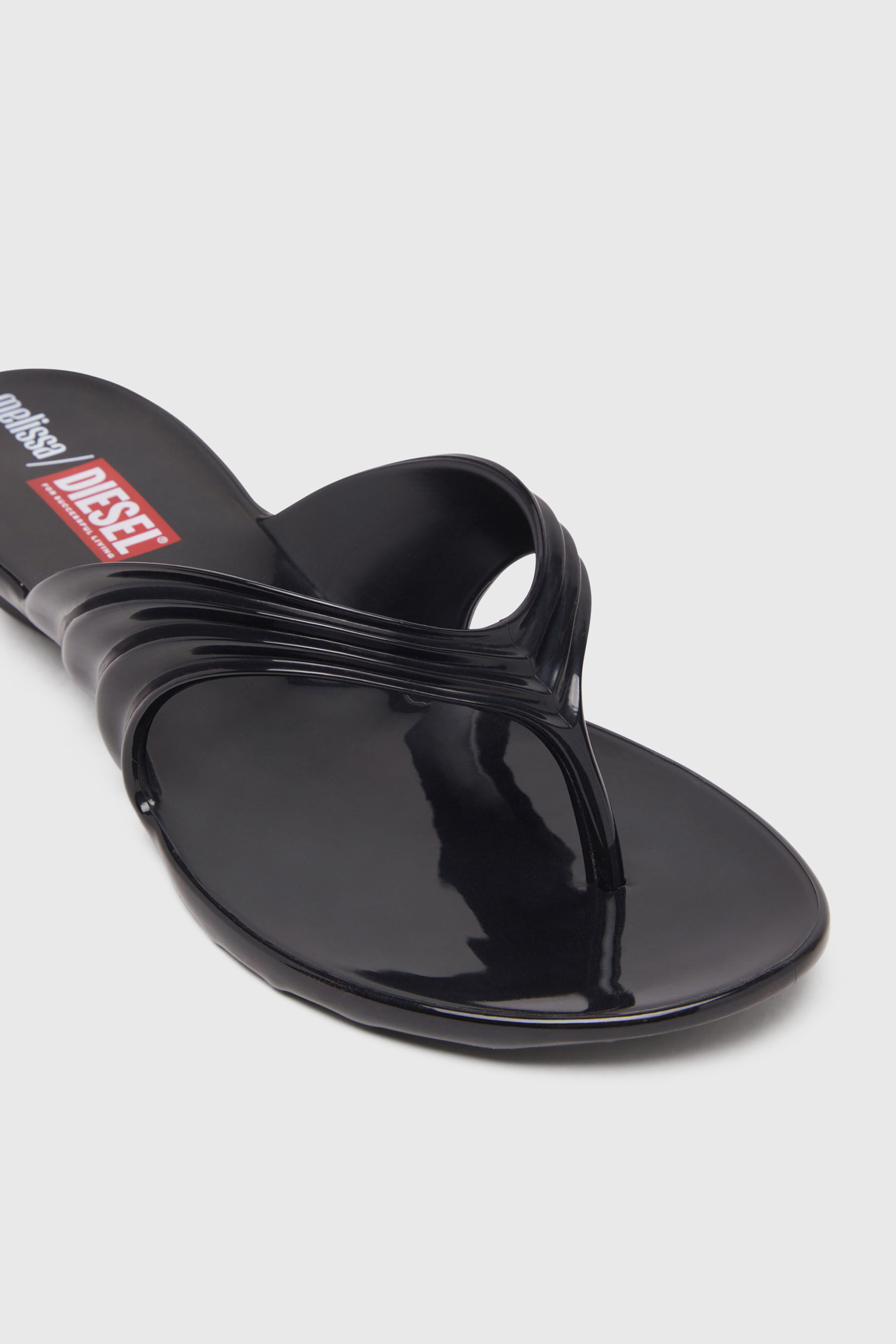 Women's Sculptural flip-flops in Melflex® | Black | Diesel {{Country}}