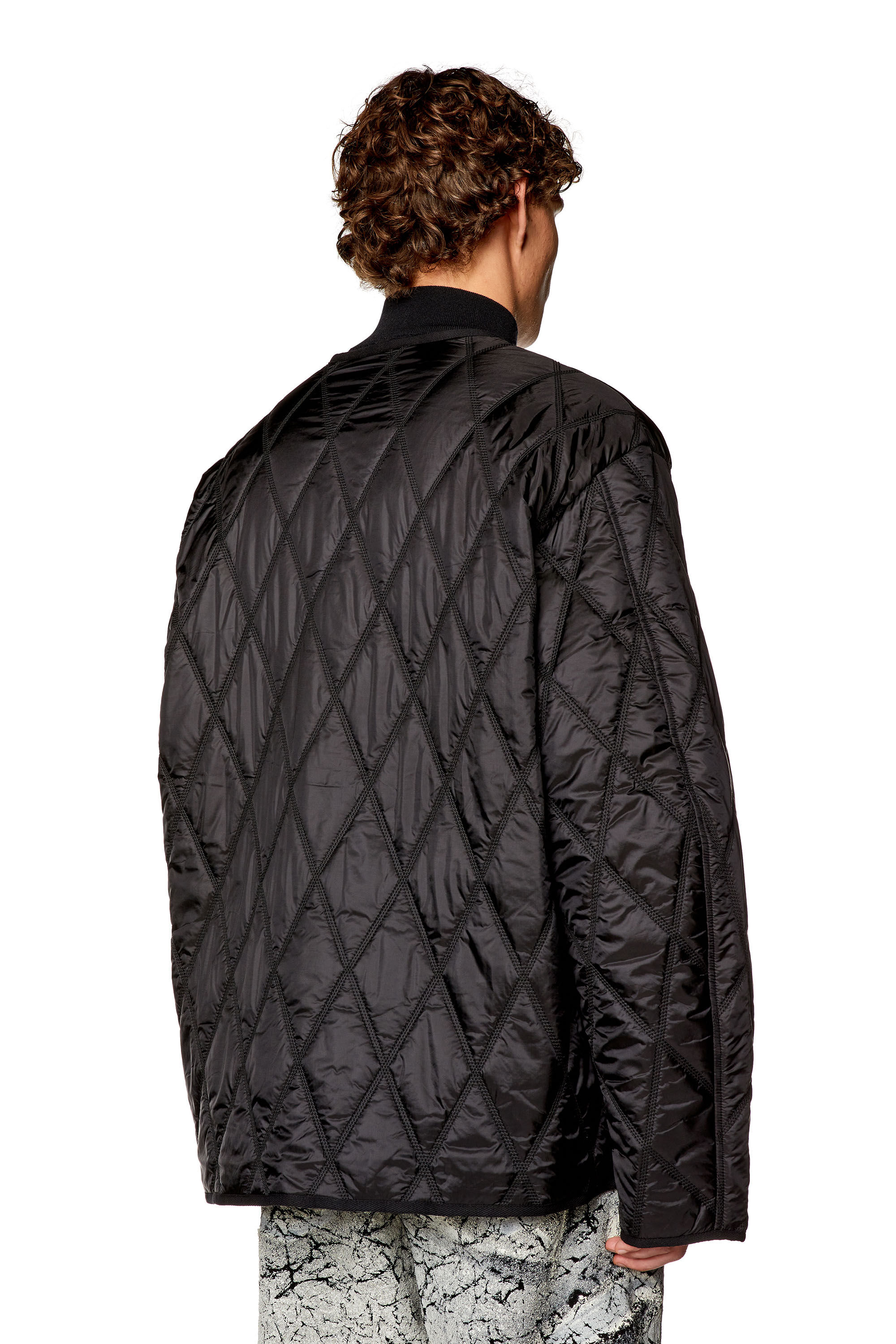 Men's V-neck jacket in quilted nylon | Black | Diesel