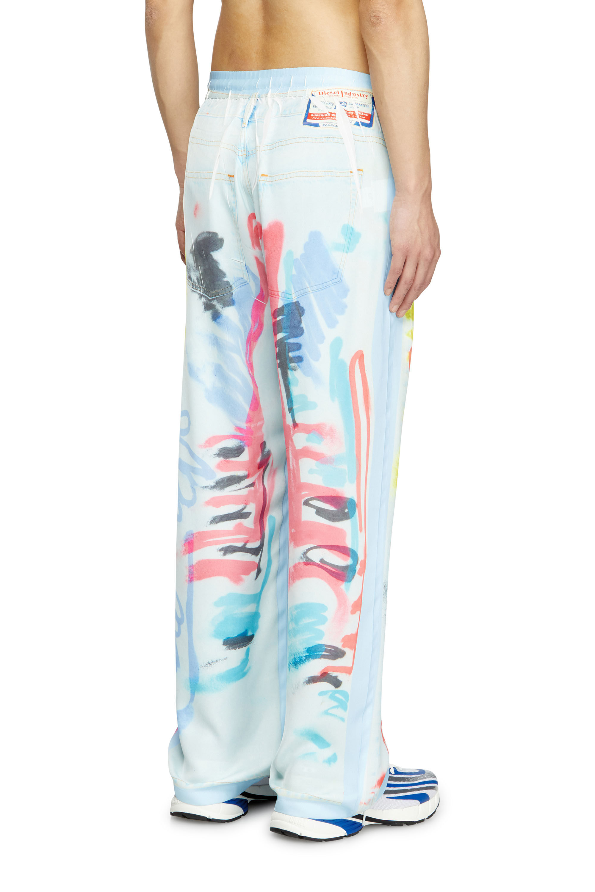 Women's Relaxed pant with graffiti print | Multicolor | Diesel Women's Relaxed pant with graffiti print | Multicolor | Diesel