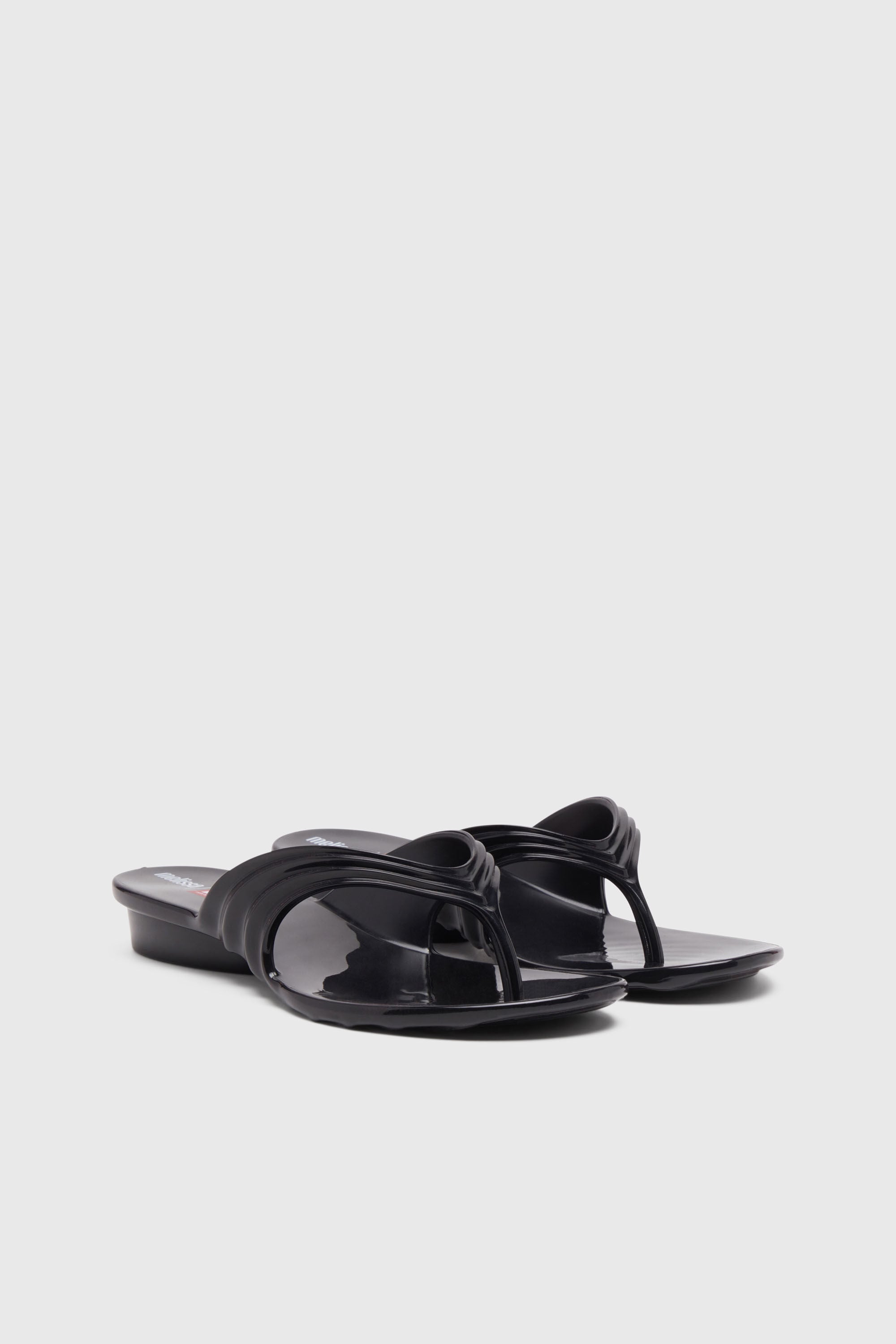 Women's Sculptural flip-flops in Melflex® | Black | Diesel {{Country}}