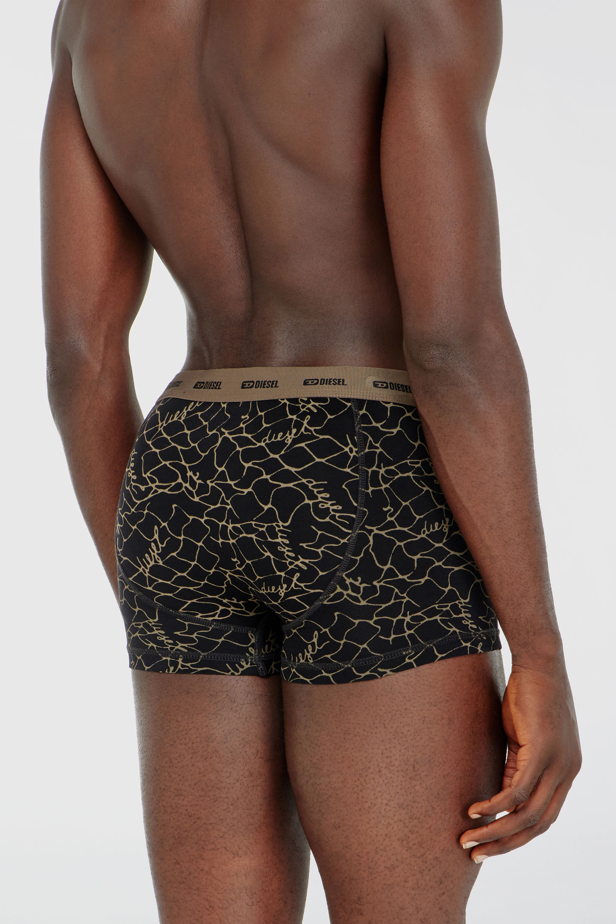 Diesel - DAMIEN-UTLT-3PACK, Man's Three-pack of trunks with graphic motif in Black/Beige - 4