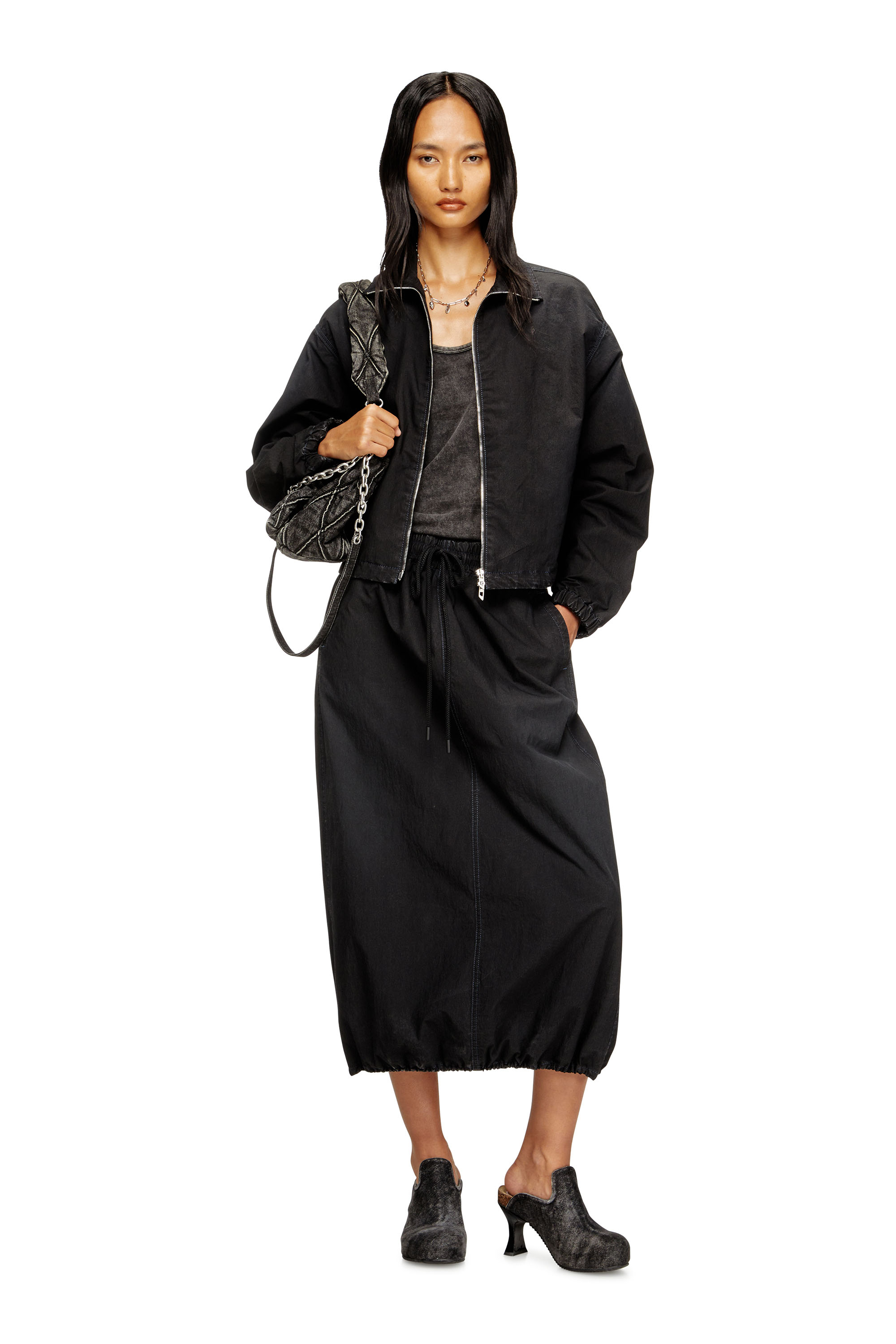 Diesel - DE-SANDERZ JOGG, Woman's High-neck technical JoggJeans jacket in Black - 1