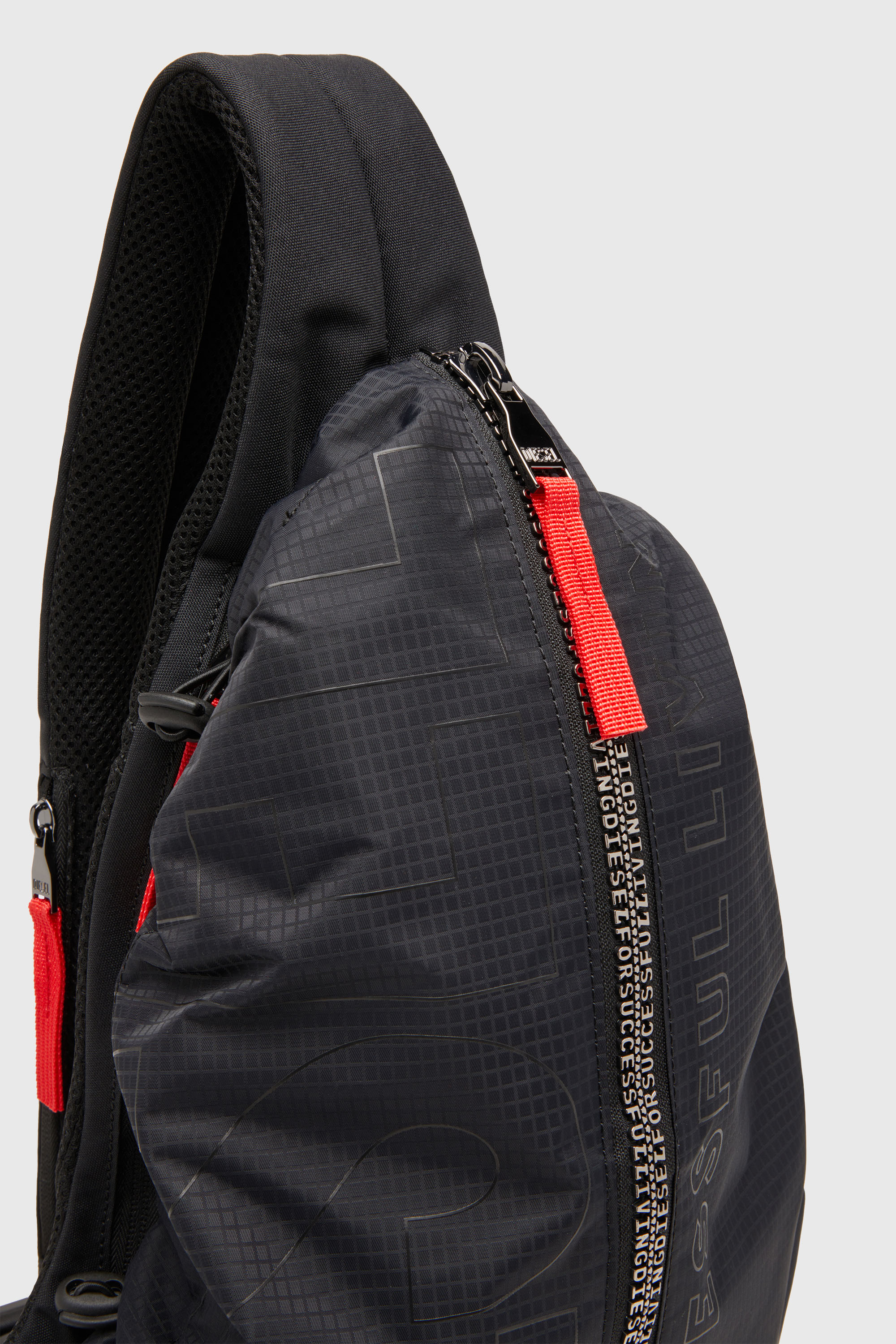 Men's Zip-D-Sling backpack in check-jacquard shell | Black | Diesel TR