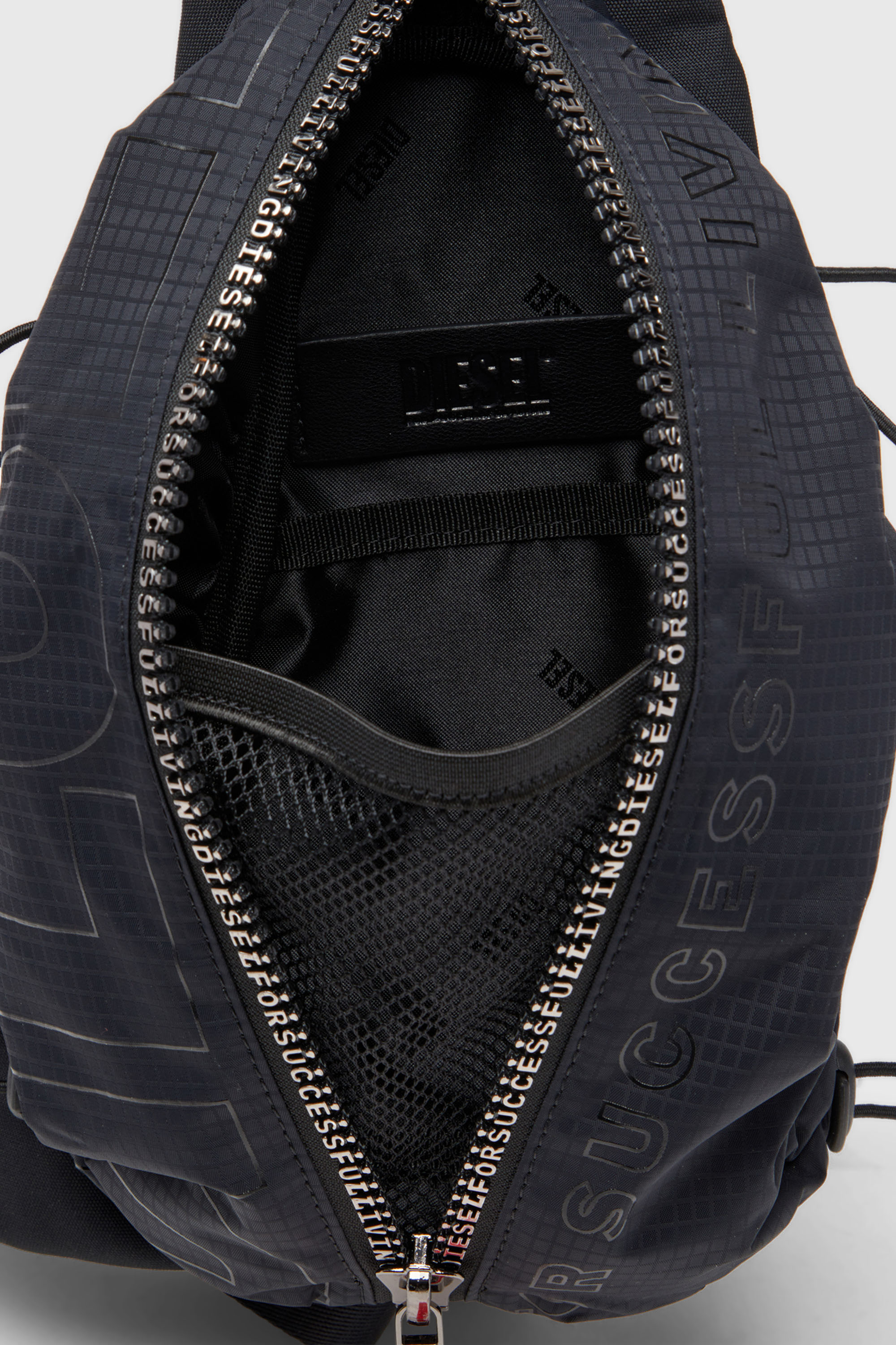 Men's Zip-D-Sling bag in check-jacquard shell | Black | Diesel TR